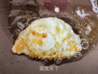 煎钱袋蛋的做法步调：4
