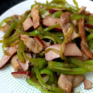 鸡蛋干猪肉炒辣椒的做法步调：15