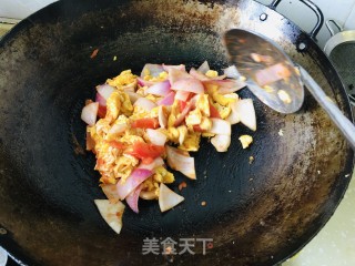 西白柿洋葱炒鸡蛋的做法步调：8