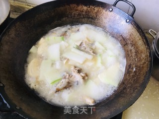 冬瓜鱼头炖豆腐的做法步调：5