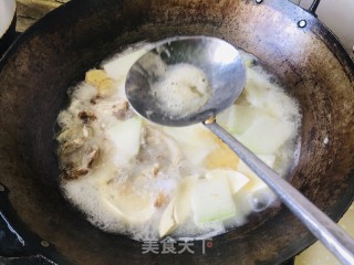 冬瓜鱼头炖豆腐的做法步调：4