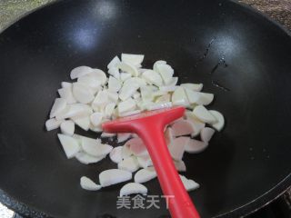 咸菜圆蛤炒茭利剑的做法步调：4