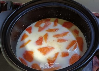 木瓜桃胶白角米炖牛奶的做法步调：7