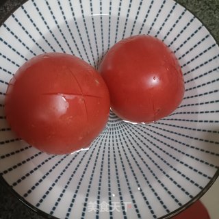 西白柿炒蛋的做法步调：1
