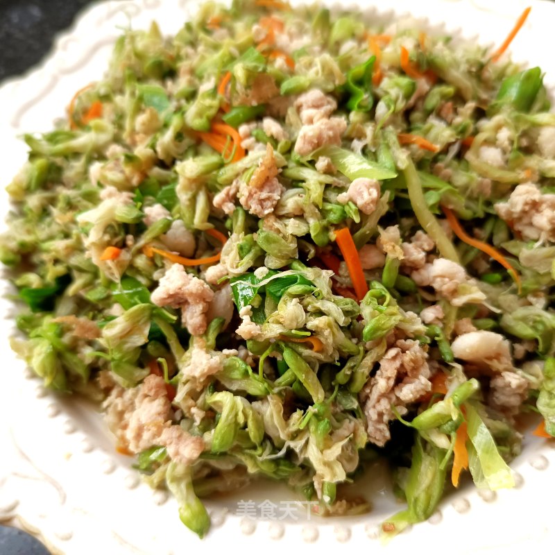肉终炒槐花的做法