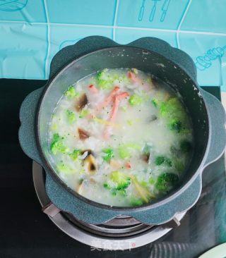 水腿京彩粥的做法步调：9