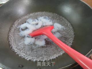 年夜蒜炒魔芋结的做法步调：2