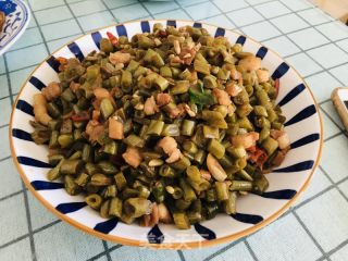 酸豆角炒肉丁的做法步调：9