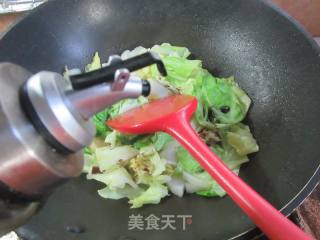 萝卜炒包心菜的做法步调：7