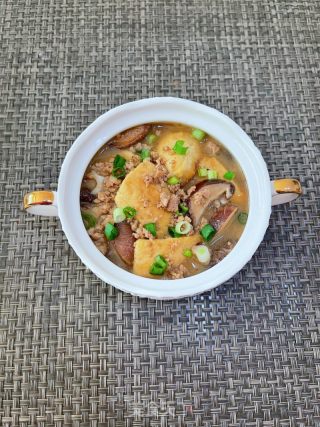 喷鼻菇肉沫豆腐煲的做法步调：15