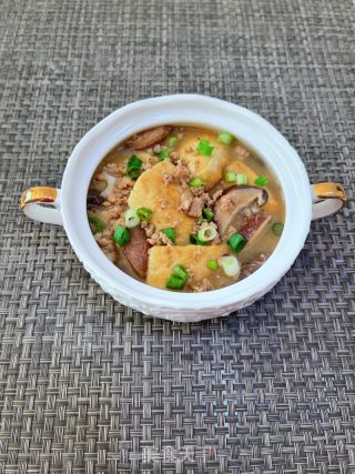 喷鼻菇肉沫豆腐煲的做法步调：16