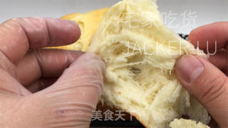 浓奶油吐司，无黄油版本，量天轻巧又韧性推丝，披发着浓重奶喷鼻。的做法步调：22