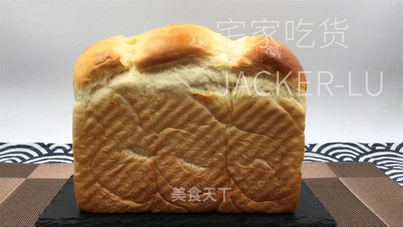浓奶油吐司，无黄油版本，量天轻巧又韧性推丝，披发着浓重奶喷鼻。的做法