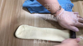 浓奶油吐司，无黄油版本，量天轻巧又韧性推丝，披发着浓重奶喷鼻。的做法步调：12