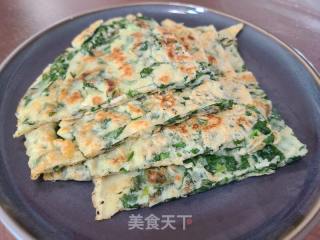 十喷鼻菜鸡蛋煎饼的做法步调：11