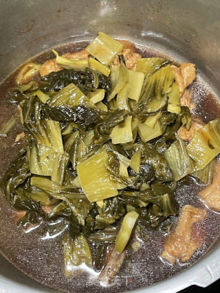 酸菜焖排骨的做法步调：14